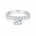 Anillo Solitario Corte Redondo con Banda Half Eternity